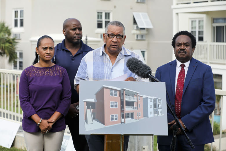 L-R: MP Tinee Furbert (Representative for Constituency 4, St. George’s South), Keino Furbert-Jacobs (Project Manager Bermuda Housing Corporation), Minister Lt. Col. David Burch, Major Barrett Dill (General Manager Bermuda Housing Corporation)