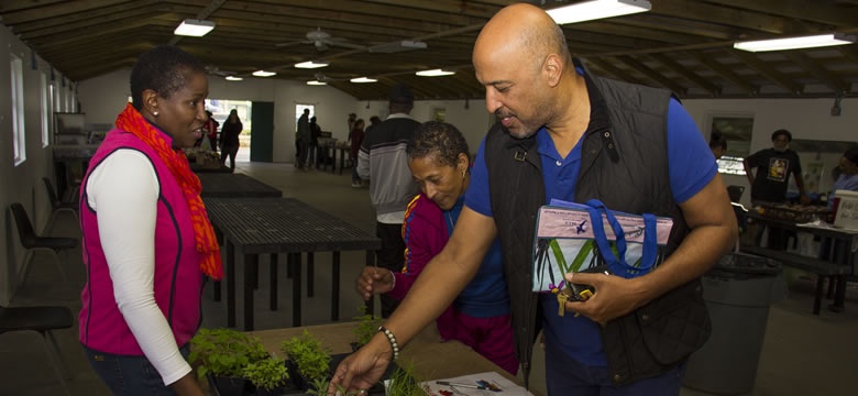 Bermuda Farmers' Market reopened for the season at the Botanical Gardens and Minister of the Environment the Hon. N. Cole Simons, JP, MP attended