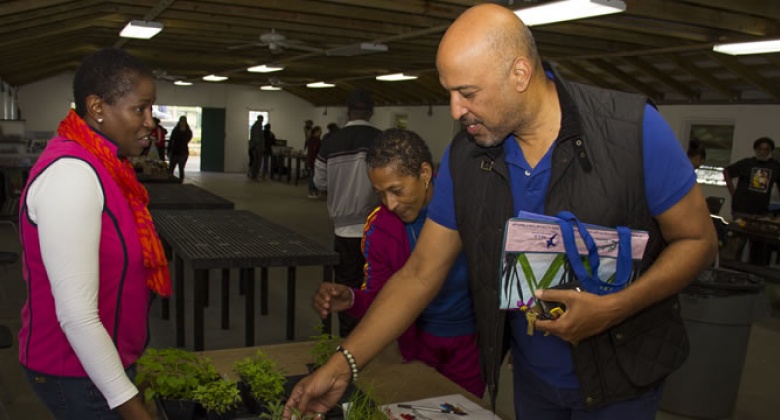Bermuda Farmers' Market reopened for the season at the Botanical Gardens and Minister of the Environment the Hon. N. Cole Simons, JP, MP attended